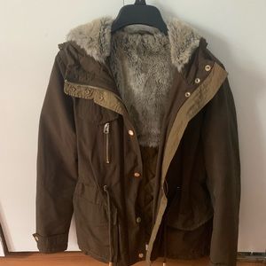 Olive green women’s jacket with fur hood - size XS